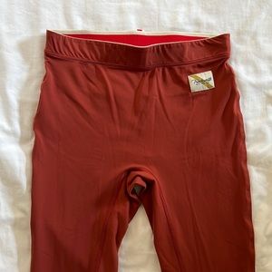 Tracksmith terra cotta running pants leggings tights size small w/ zipper pocket